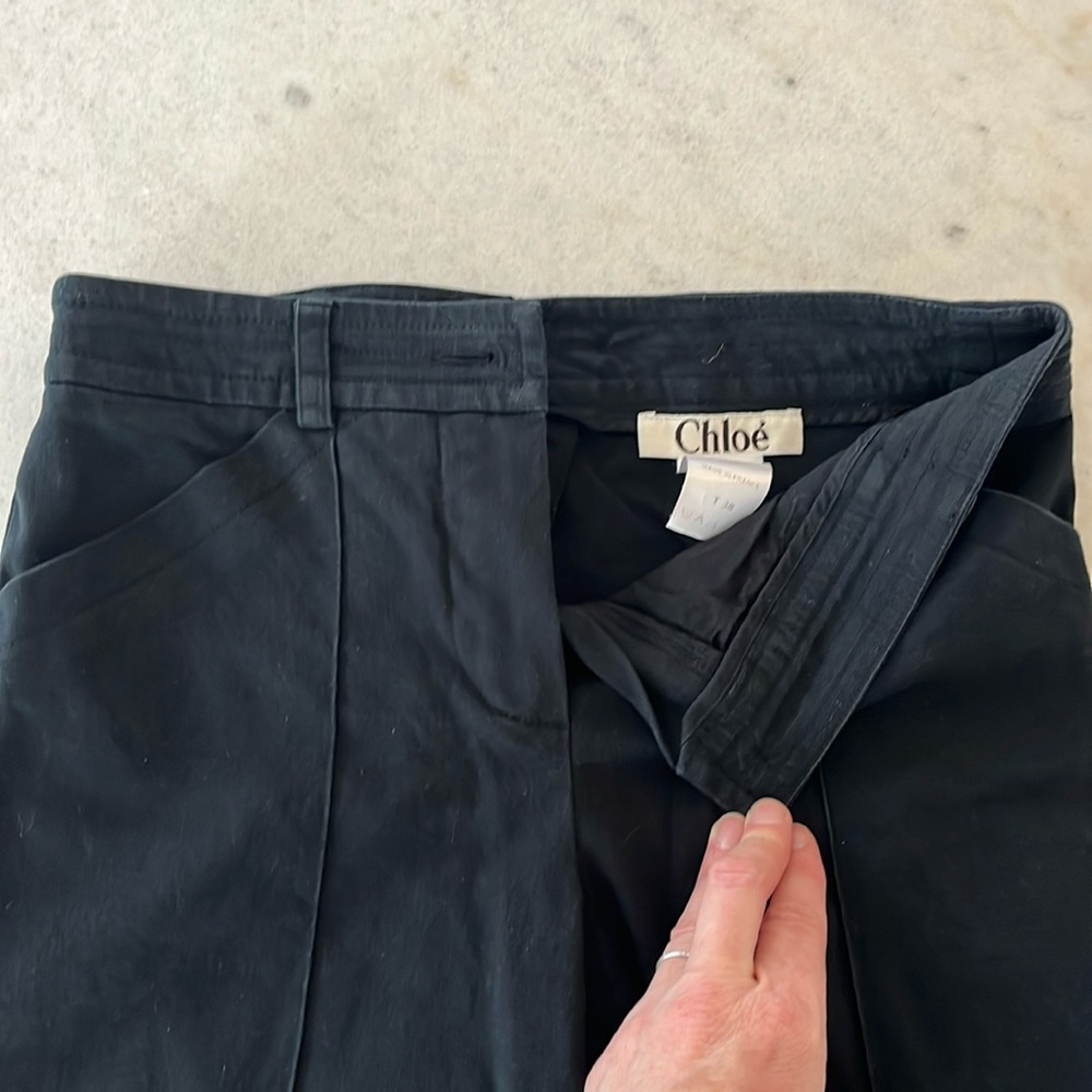 Chloe navy-black bootcut trousers.